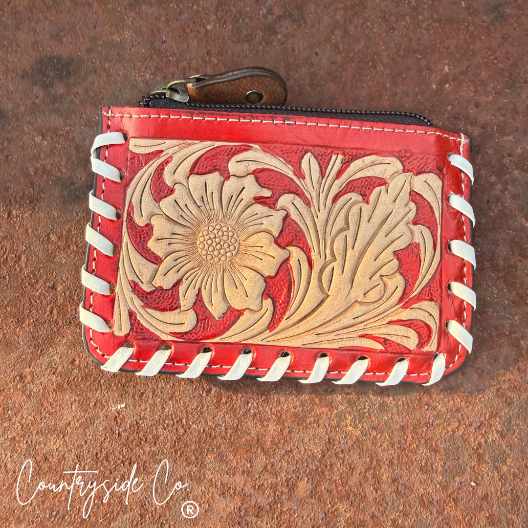 The Sweetwater Cowhide Laced Floral Pouch