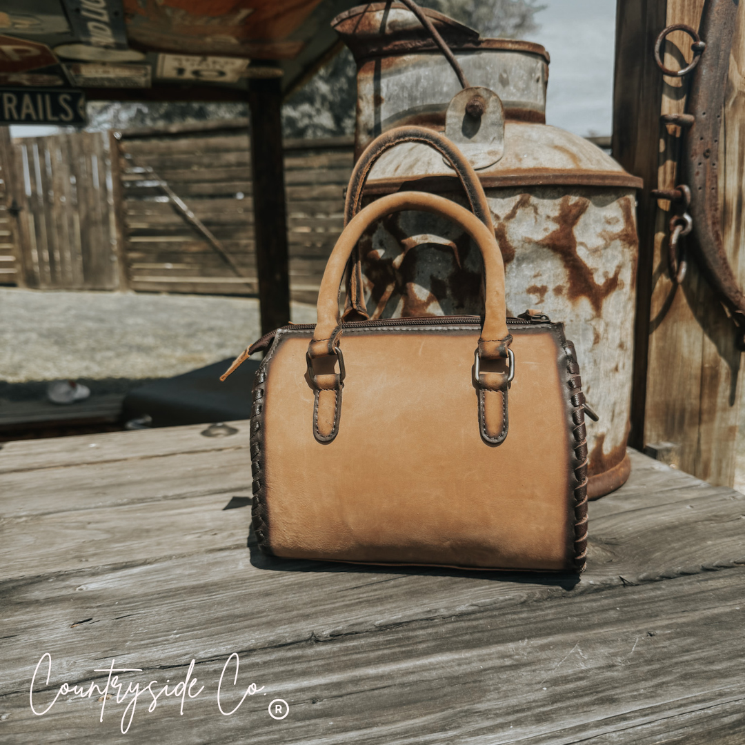 Bailey Leather Small Barrel Bag