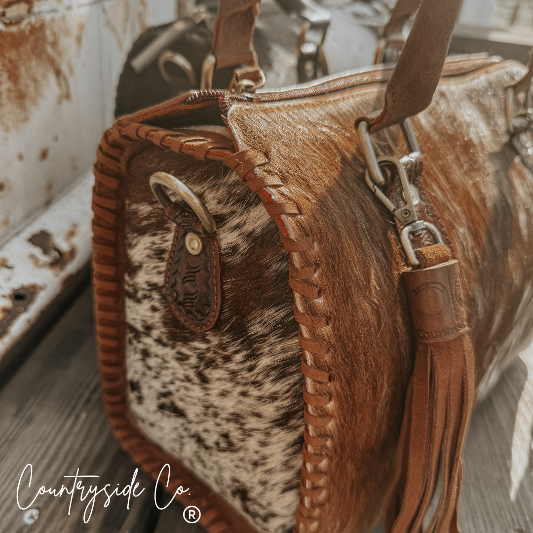 Signature Cowhide Speedy Bag