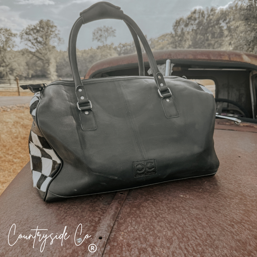 Reckless Checkered Cowhide Duffle Bag
