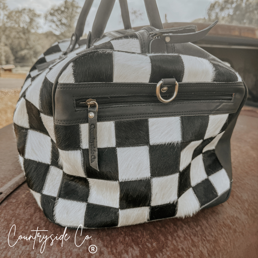 Reckless Checkered Cowhide Duffle Bag