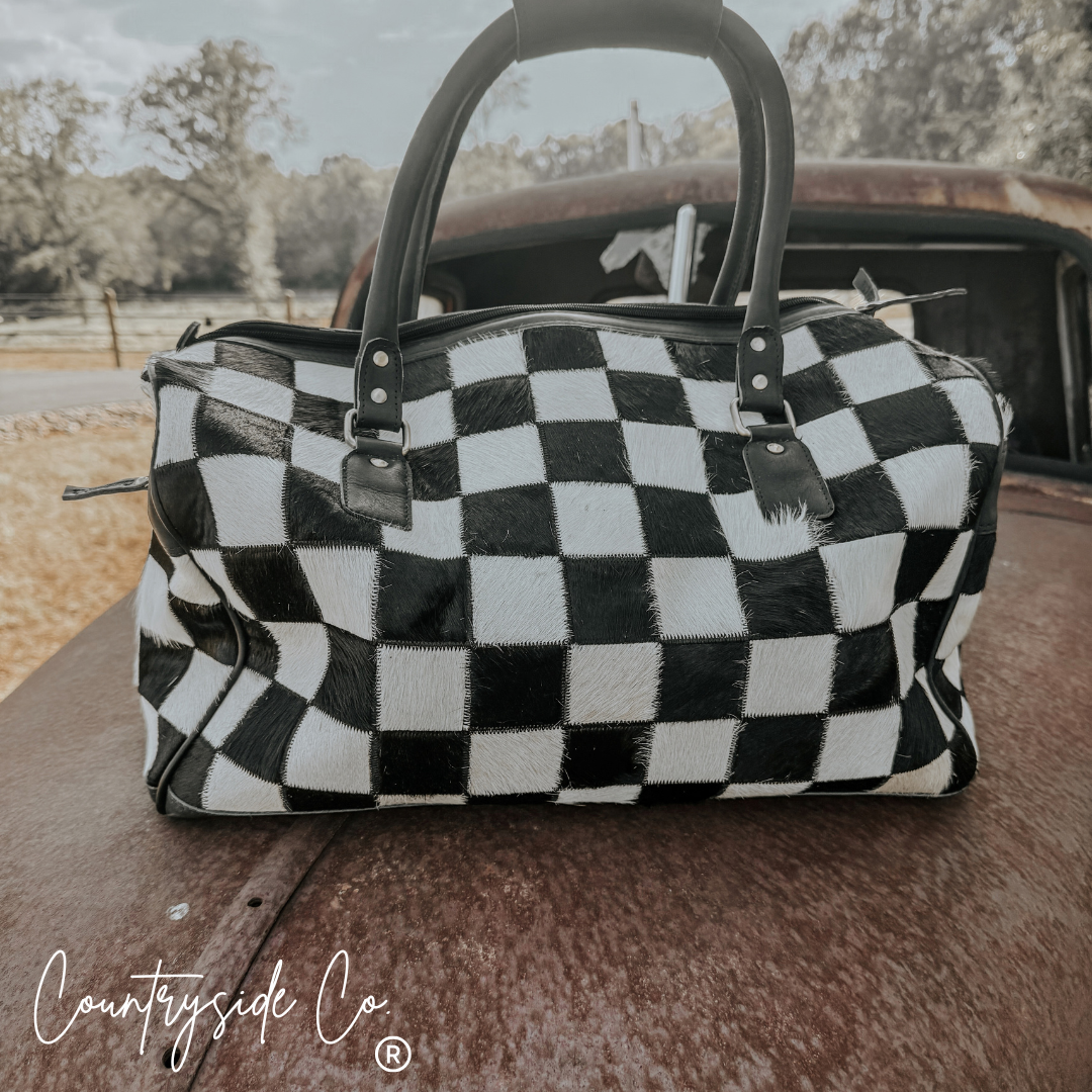 Reckless Checkered Cowhide Duffle Bag