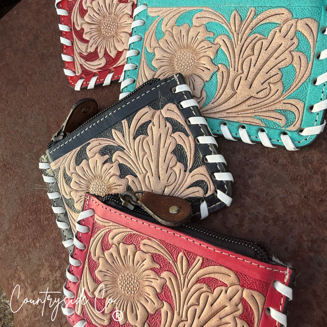 The Sweetwater Cowhide Laced Floral Pouch