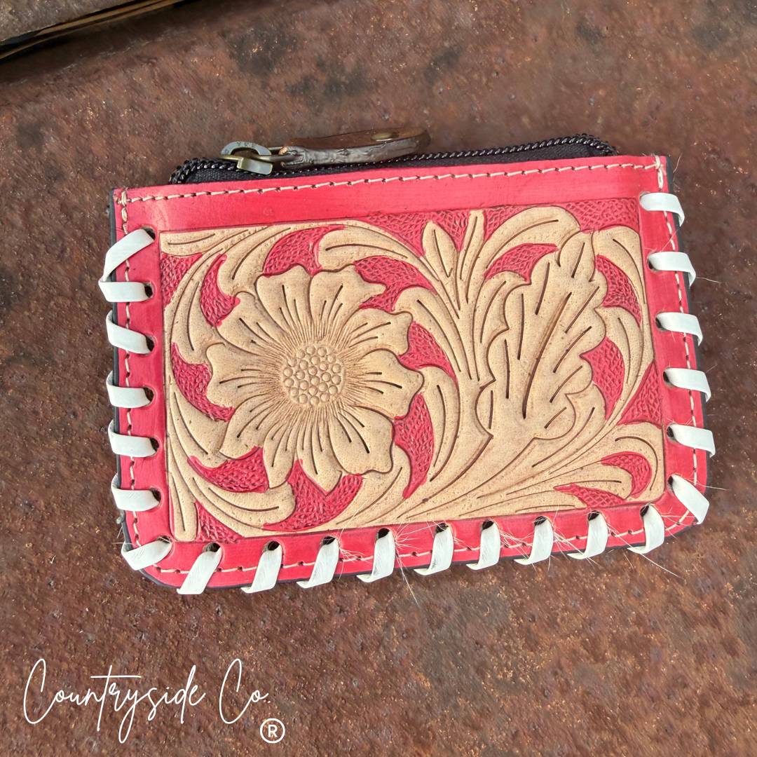 The Sweetwater Cowhide Laced Floral Pouch
