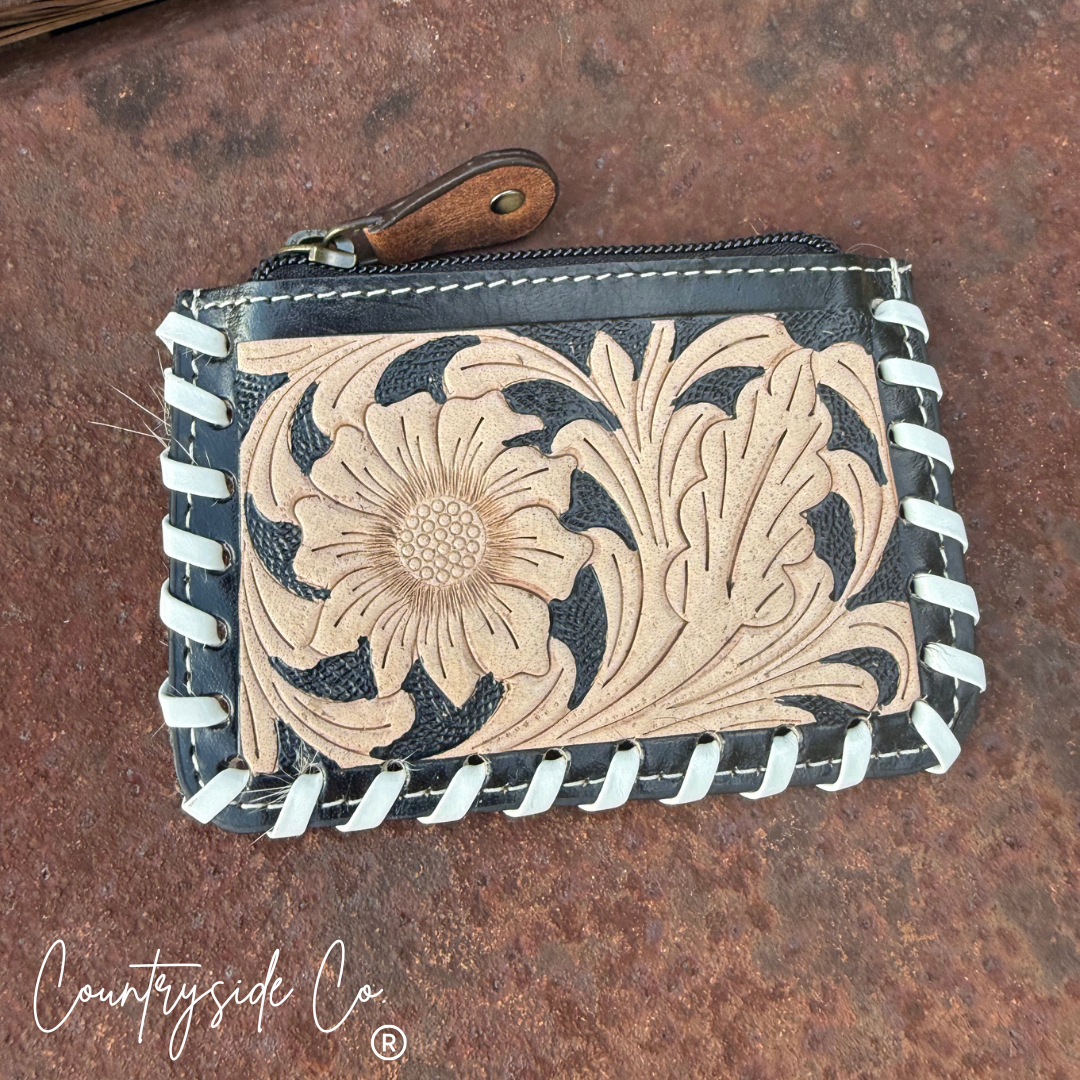 The Sweetwater Cowhide Laced Floral Pouch