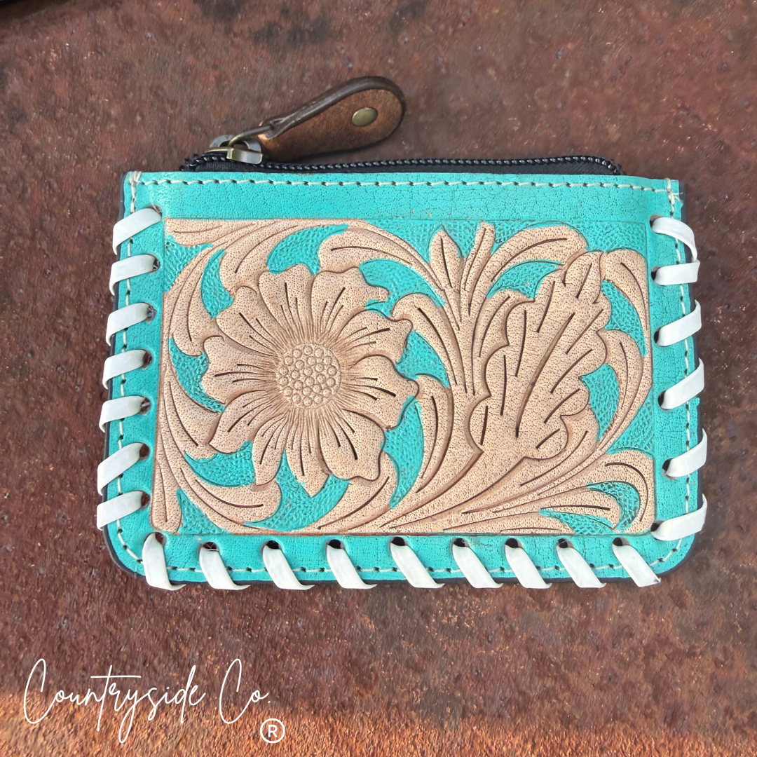 The Sweetwater Cowhide Laced Floral Pouch