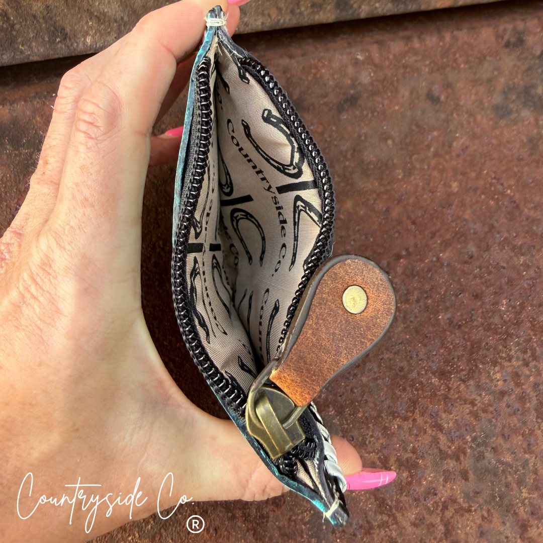 The Sweetwater Cowhide Laced Floral Pouch