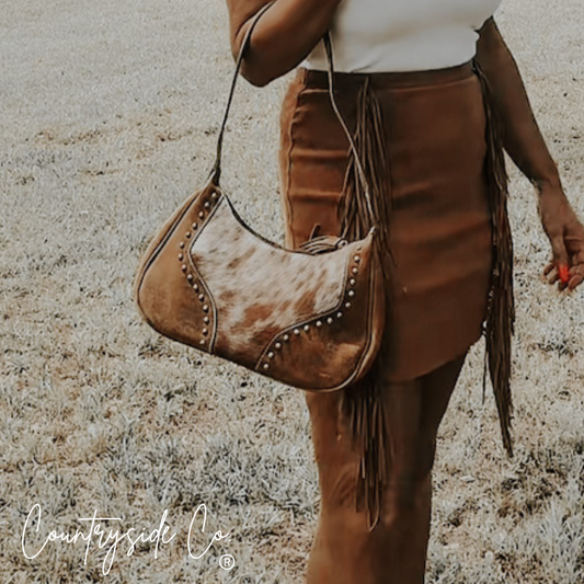 Rodeo Royalty Cowhide Purse by Countryside Co.